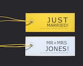The DELUXE Edition - 2 custom Wedding Luggage Tags that no Honeymooner should travel without.  Leather back.