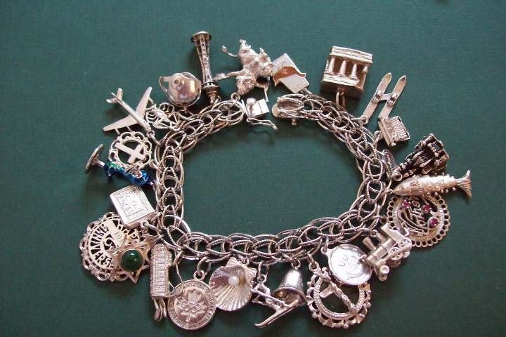 24 Charm Vintage Sterling Silver Bracelet