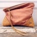 THE LIBRO pink leather clutch