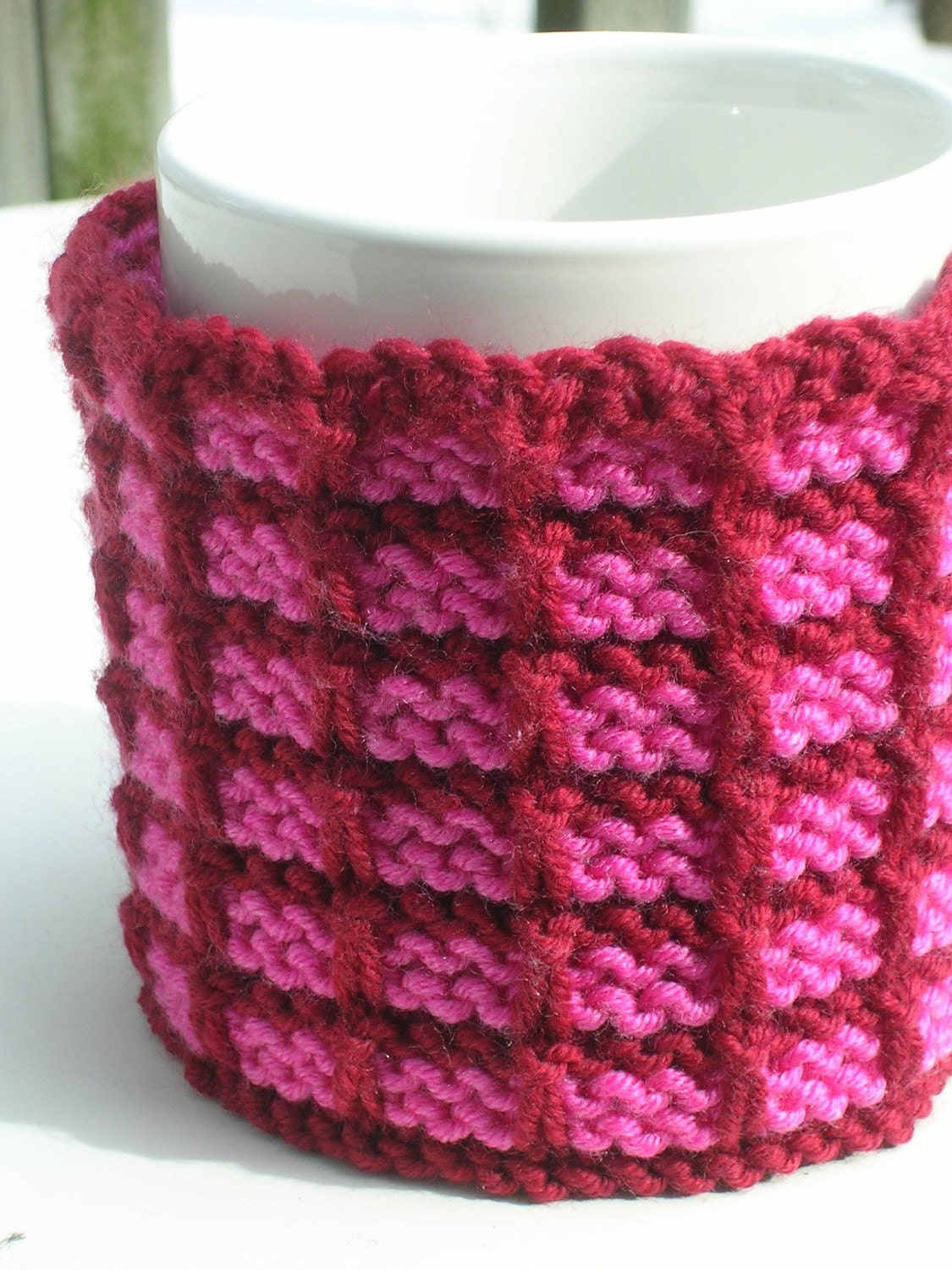 Handknit Pink and Red Checkerboard Mug Cozy