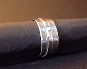 Sterling silver textured, one size fits all ring. FREE SHIPPING WORLDWIDE