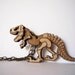 Dinosaur Necklace by Vectorcloud