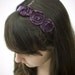 crushed poppies. ribbon. (plum)