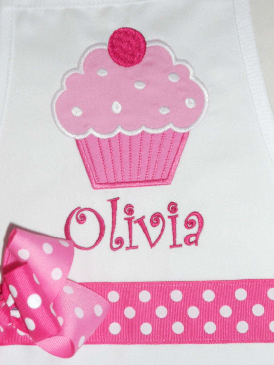 Pink Cupcake on White Apron