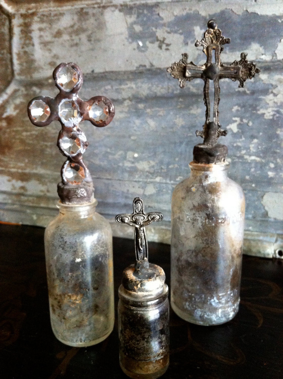 Set of 3 vintage bottles with crosses