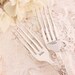 Mr. & Mrs. Wedding Cake Forks: Hand stamped silver plated forks. Floral fluted handle new and lovely with silver storage bag.