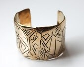 Cave Dweller Cuff  in bronze