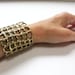 Metal Crochet Cuff  - A  Collaborative Art Piece by Cheryl Cambras and Tiny Armour