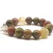 Unakite bracelet with Goldstone and Jade faceted beads