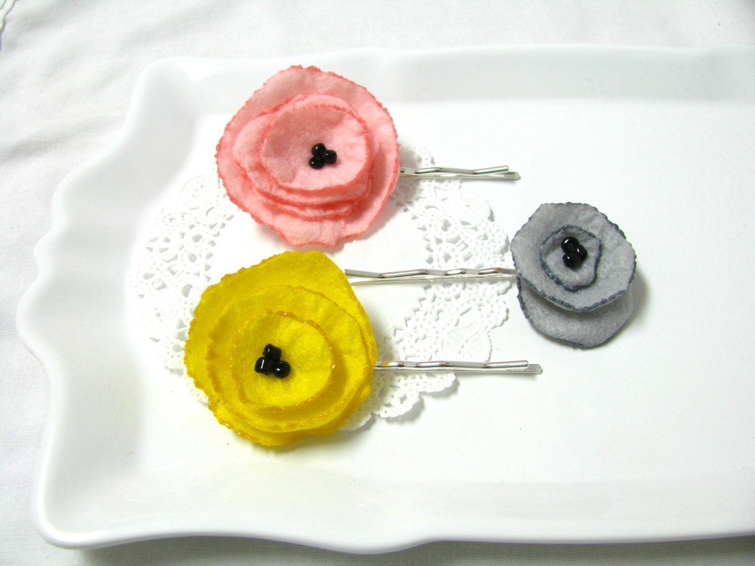 april showers bring poppy flower hair charms.