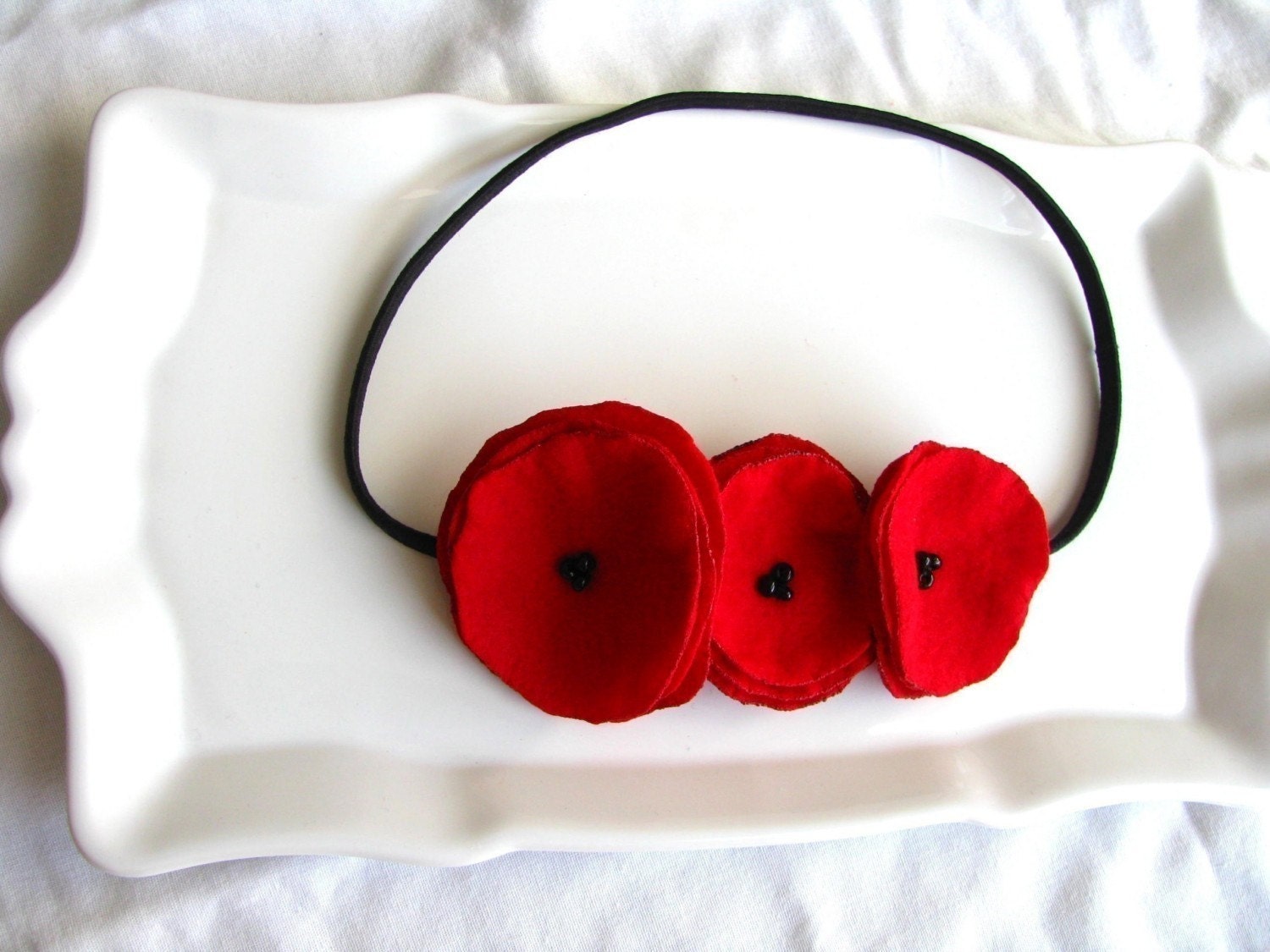 crushing on you red felt poppy garland headband.