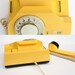 Vintage yellow rotary phone
