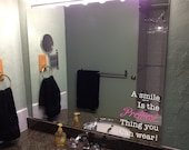 a smile is the prettiest thing you can wear quote mirror decal
