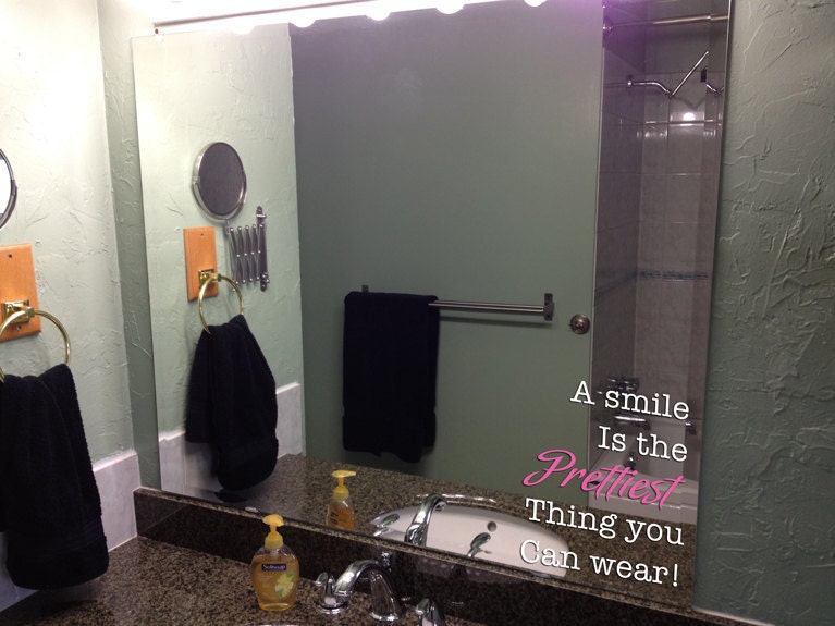 a smile is the prettiest thing you can wear quote mirror decal