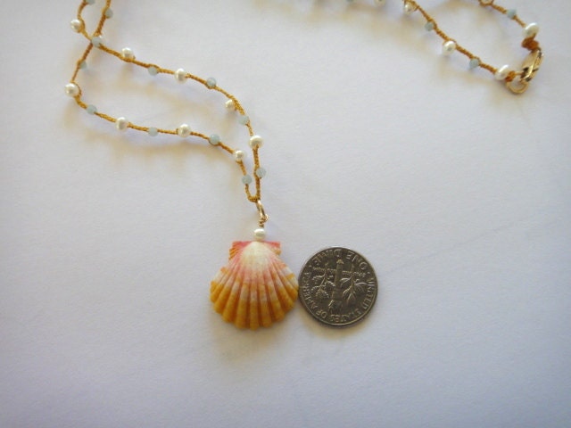 Sunrise Shell on Gold Braided Cord with Pearls and Apatite
