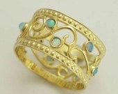 14k Yellow gold women's wedding band with blue opal gems - Shades of spring.