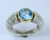 Sterling silver and yellow gold ring with blue topaz stone - day by day.