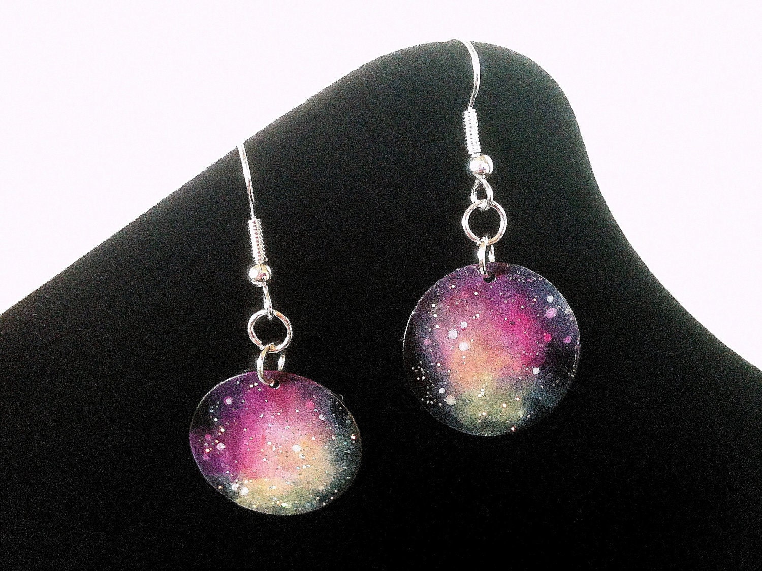 Stargazer Nebula Earrings Hand Painted in Fuschia, Orange, and Yellow by Roots and Wings Designs.