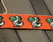 Yoshi in a row, Nintendo friendship bracelet