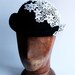 Bowler hat black with white lace