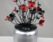 Simple Red and Black Metal Flowers  In Vintage Tea Canister