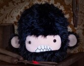 Severed Sasquash Head...black & lavander
