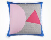 Pillow cover with pink triangle