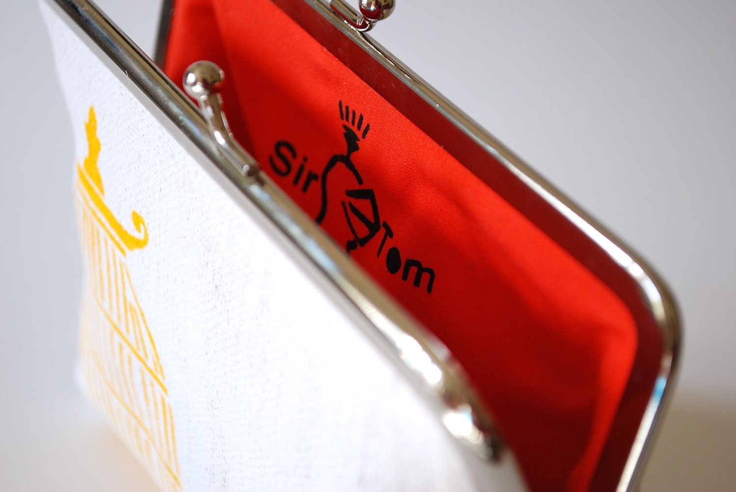 White hemp purse with bird and cage