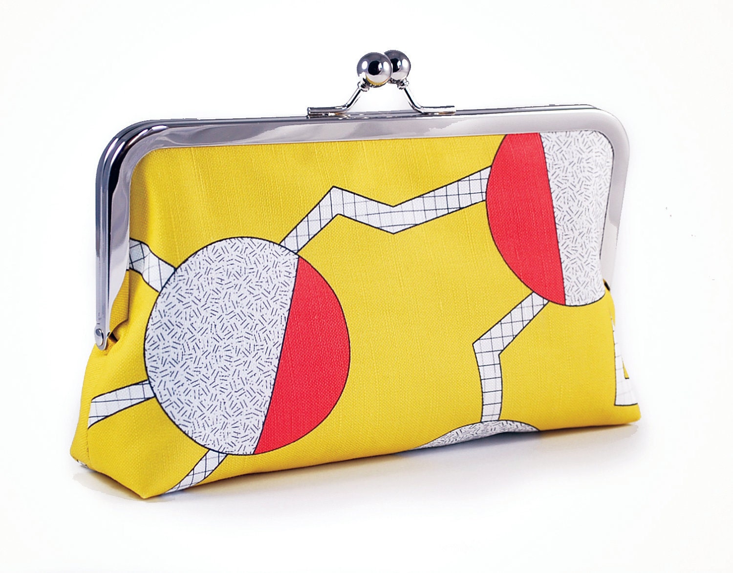 Yellow clutch with circles and zigzags