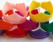 SAVE 15% on 10 eco friendly lexa felt crowns with adjustable ribbon ties. available in 22 colors.  as seen on glo.msn and dailycandy.com