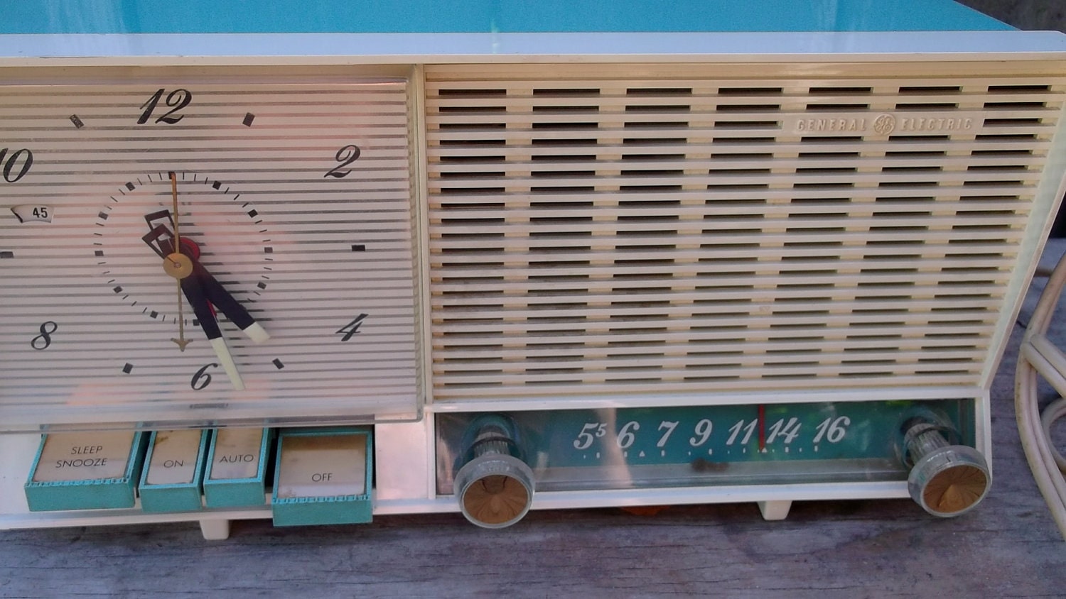 vintage 50s clock radio mid century GE turquoise radio