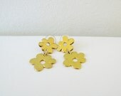 Vintage gold metal flower earring.