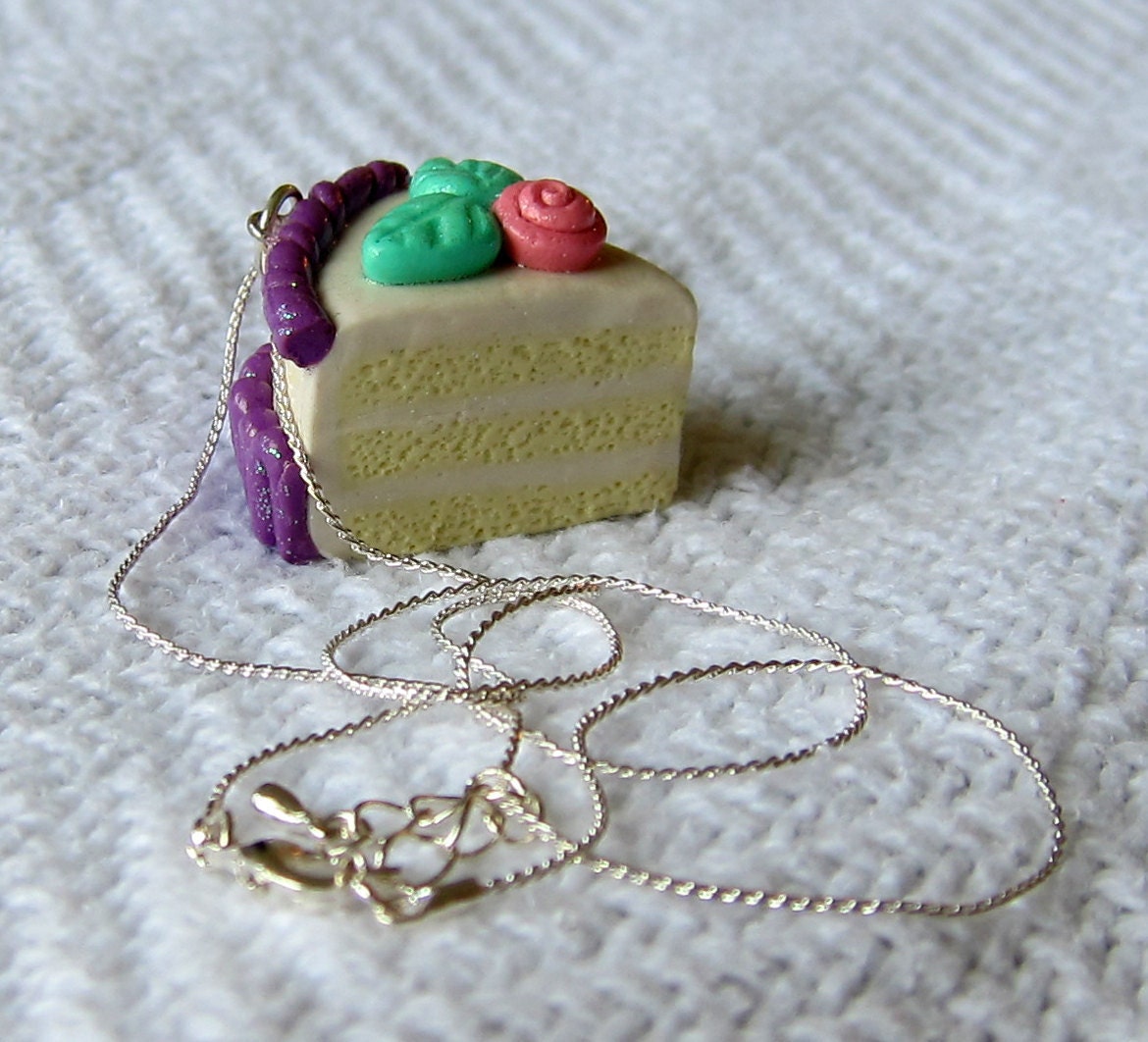 Vanilla Layered Birthday Cake with Pink Roses and Purple Frosting Necklace / Pendant