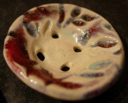 Red and white ceramic buttons