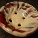 Red and white ceramic buttons