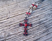 Strikingly beautiful black 77X55mm filigree cross pendent with ruby red rhinestones necklace.