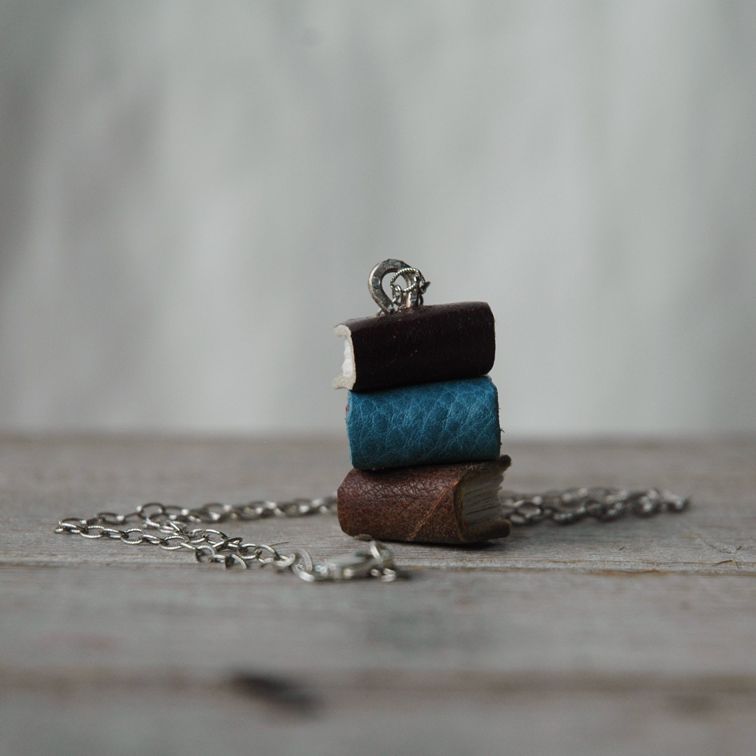 Stacks Book Necklace: Winter Trio, reclaimed leather, silver.