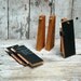 Trio of chalkboard tablets and stands made from reclaimed wood