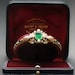 Victorian gold diamond bangle with magnificent emerald in box by bapst & falize (ca.1870)