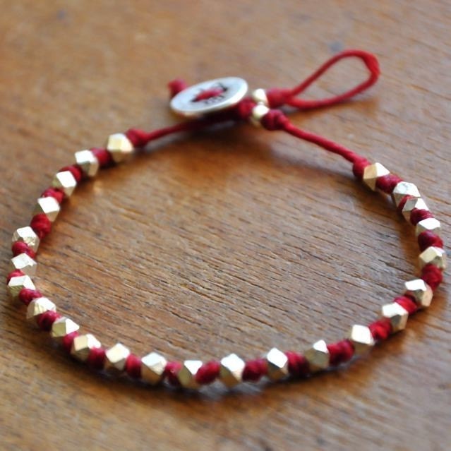 hand knotted faceted fine silver nuggets bracelet on RED waxed irish linen cord bracelet