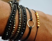 sterling silver circle bracelet. Leather Karma bracelet.