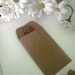 100 WILDFLOWER SEED FILLED Kraft paper envelope favors- butterfly and hummingbird mix