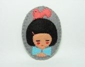 Contemporary squirrel and girl felt pin