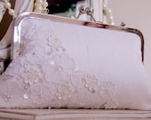 Bride's white lace clutch bag