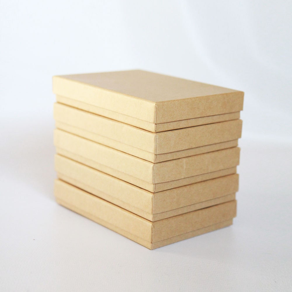 5- Kraft  Boxes filled with cotton 7.25 x 5.5 x 1  Works great for photography presentation