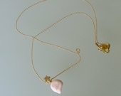 opaque pale pink skull & star necklace