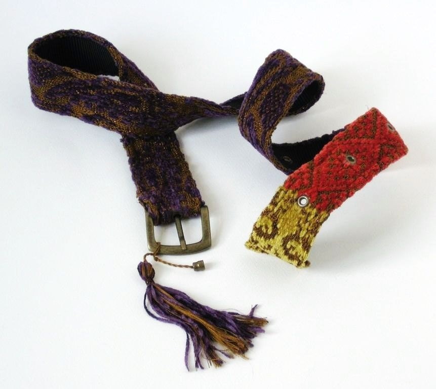 Boho chic knitted belt of bronze cotton, purple, orange red and yellow velvet and metal bronze yarn KALILA.