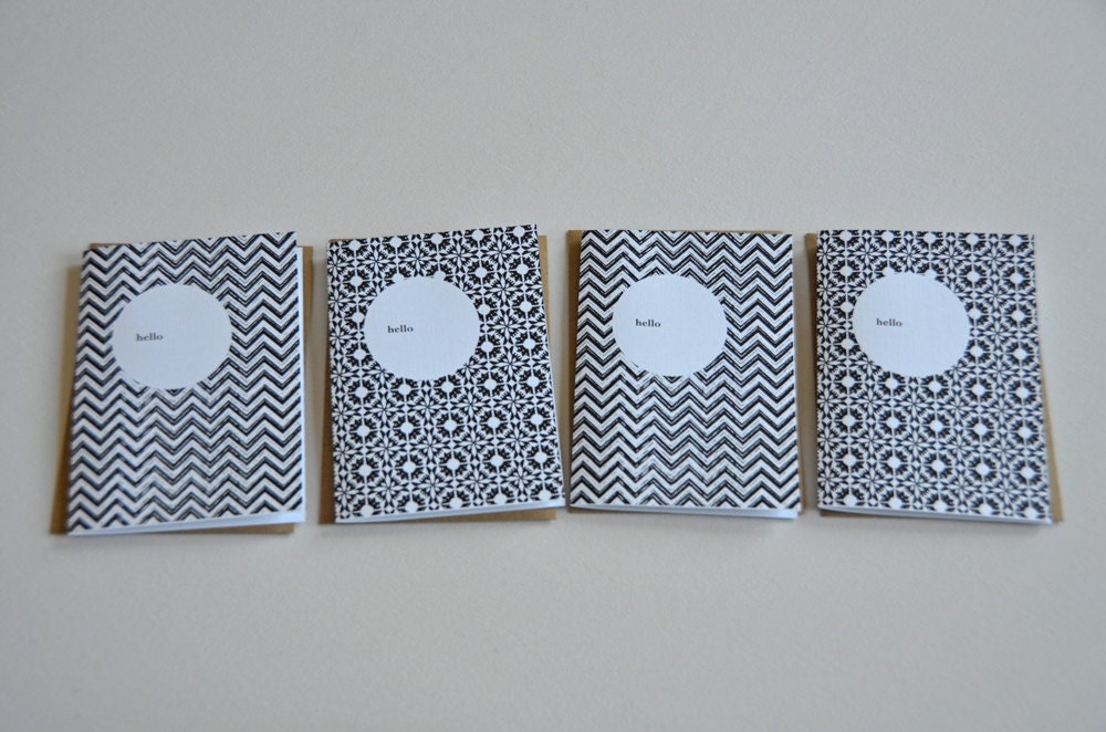 Set of 8, blank note cards. 9 envelopes. Hello. Goodbye on the back. Black and white patterns.