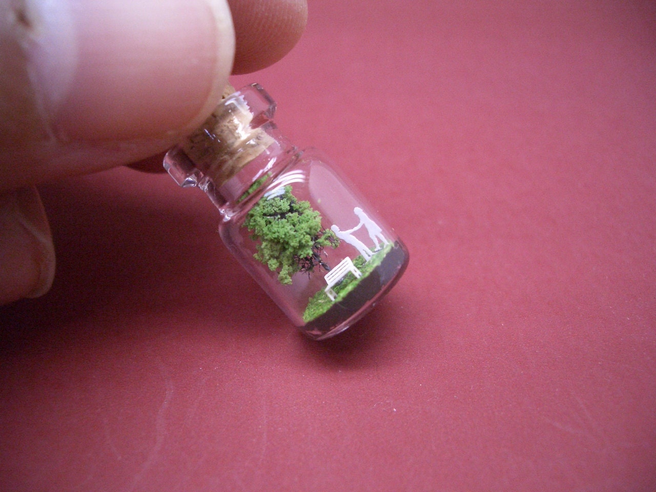 Tiny green tree and a couple in a tiny bottle ver.4