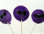 Lavender plum with cracked black pepper lollipop